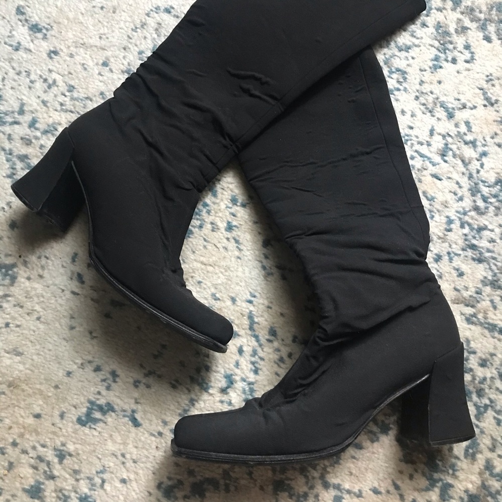 Knee high black Prada boots
